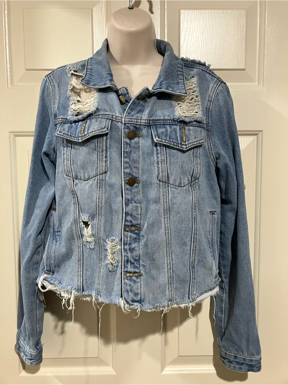 Fashion Nova woman size large cut off distressed style Denim jacket
